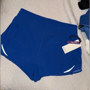 Blue Athletic Shorts with Reflective Accents